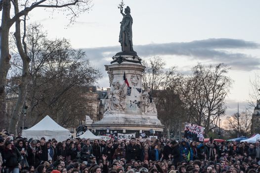 FRANCE, Paris: Thousand militants of the Nuit debout (Standing night) movement gather on April 7, 2016 at the Place de la Republique in Paris, as participants plan to spend the night camped out to protest against the government's planned labour reform and against forced evictions. It has been one week that hundred of people have occupied the square to show, at first, their opposition to the labour reforms in the wake of the nationwide demonstration which took place on March 31, 2016.