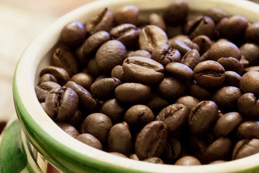 Coffee cup with coffee beans