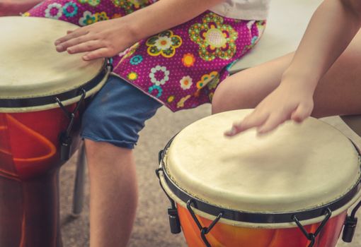 An Action Music Shot Of Children Drumming