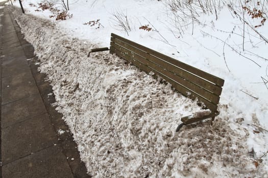 bench under the snow in denmark