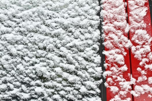 red car under the snow in denmark