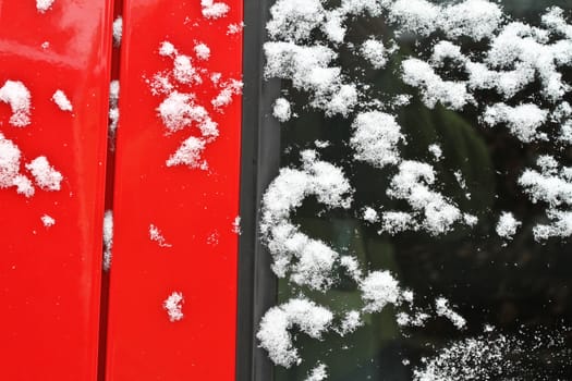 red car under the snow in denmark