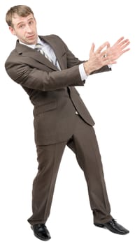 Surprised businessman holding empty space isolated on white background