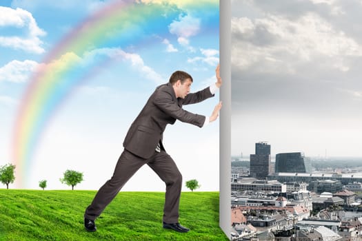 Businessman changing city on nature landscape with rainbow