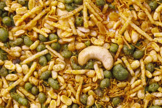 Dry roasted Indian snack mix, close-up background