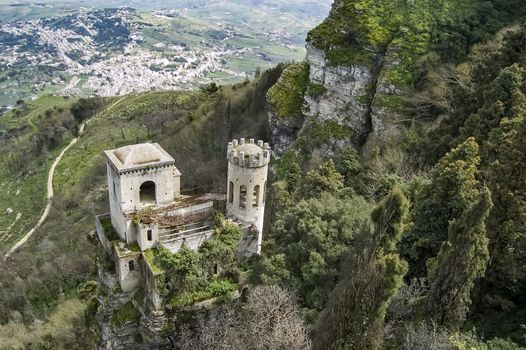 Mountain Fortress and Village of Erice on Sicily, Italy. Amazing medieval Mediterranean stone buildings and houses. Historical location and popular travel destination.