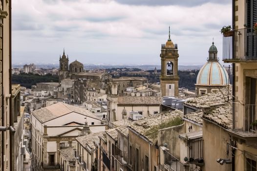 Tourists visit the monumental staircase of Caltagirone with its decorated majolica