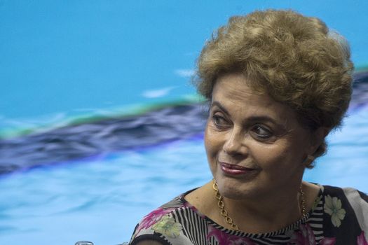 BRAZIL, Rio de Janeiro: President Dilma Rousseff looks on during the opening of the Olympic Aquatics Stadium in Rio de Janeiro, Brazil on April 8, 2016. The venue, which will host events during the 2016 Olympics in Rio, has been built with sustainable 'nomadic architecture' that will allow it to be broken down, relocated, and reassembled into two smaller arenas.