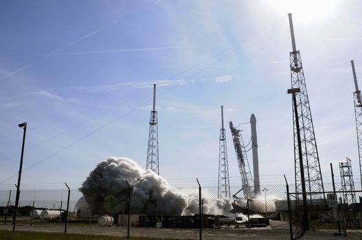 FLORIDA, Cap Canaveral: Space X's Falcon 9 rocket lifts off with an unmanned Dragon cargo craft from the launch platform in Cape Canaveral, Florida on April 8, 2016. After four failed bids SpaceX finally stuck the landing, powering the first stage of its Falcon 9 rocket onto an ocean platform where it touched down upright after launching cargo to space.