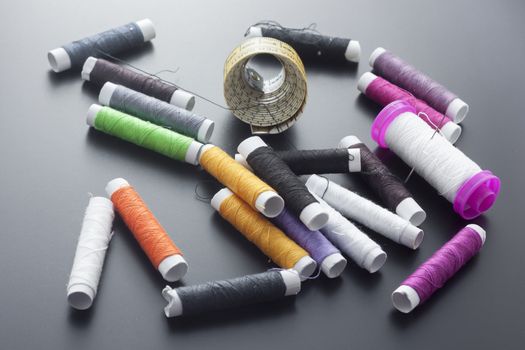 Spool of thread and pins. Sewing accessories