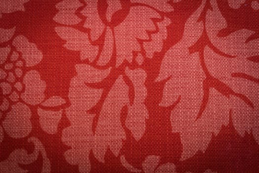 Rustic canvas fabric texture in red color.