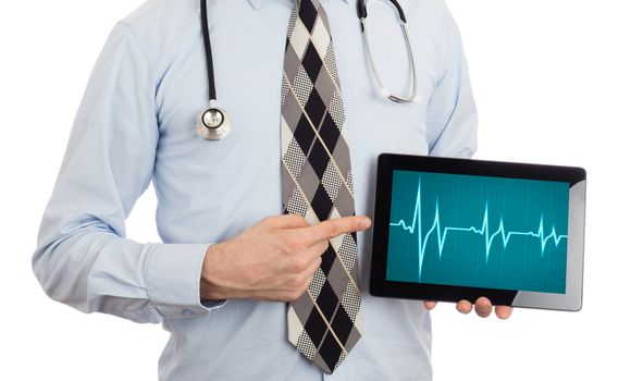 Doctor, isolated on white backgroun,  holding digital tablet - Heartbeat graph