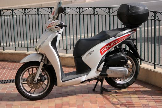 Monte-Carlo, Monaco - April 6, 2016: Honda SH 125i Motorbike Standing in Front of the Police Station. Motorcycles of Monaco Police Patrol on the City Street of Monte-Carlo