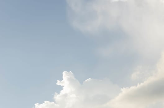 white clouds in the blue sky background