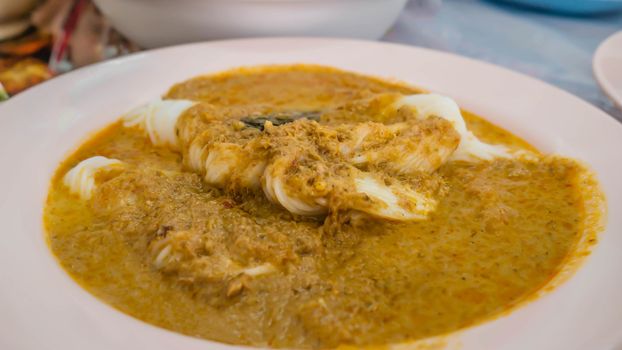 rice noodles with fish curry sauce , asian food