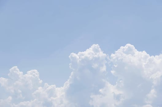 white clouds in the blue sky background