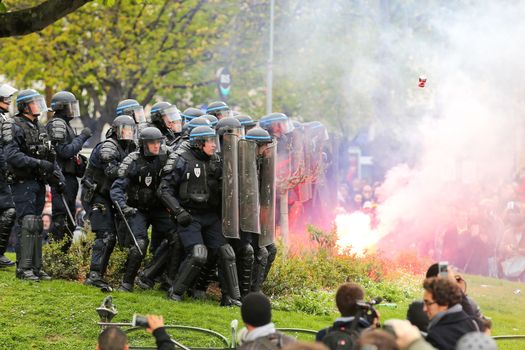 FRANCE, Paris: Riot policemen gather during a demo on April 9, 2016 in Paris, against the French government's proposed labour law reforms.