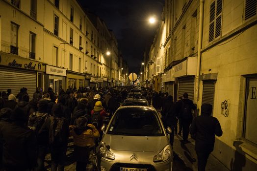 FRANCE, Paris: Hundreds of Nuit Debout militants march in Rue de la Roquette in Paris, as they want to reach French Prime minister Manuel Valls residence on April 9, 2016.