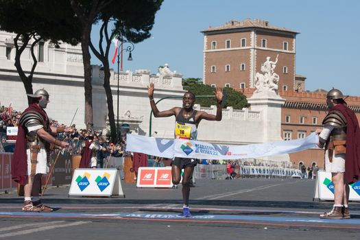 ITALY, Rome: Kenyan runner Amos Kipruto crosses the finish line of Rome City Marathon  in Rome on April 10, 2016. He won the first position in 2h08'16”.