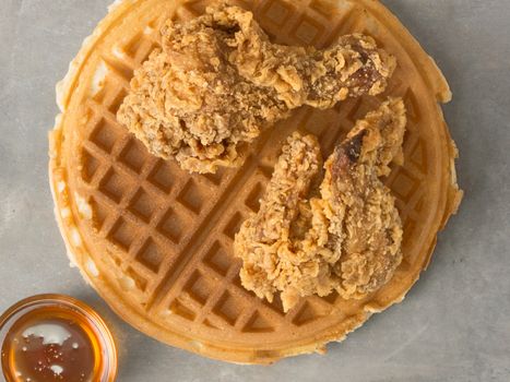 close up of rustic southern american comfort food chicken waffle