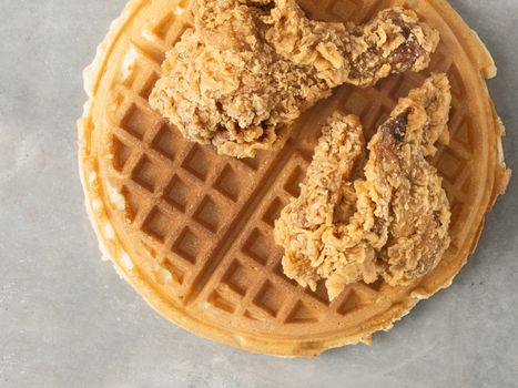 close up of rustic southern american comfort food chicken waffle