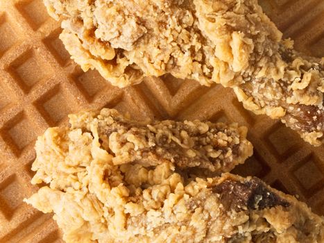 close up of rustic southern american comfort food chicken waffle