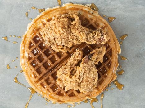 close up of rustic southern american comfort food chicken waffle