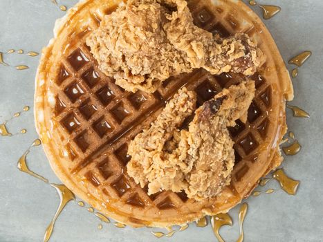 close up of rustic southern american comfort food chicken waffle