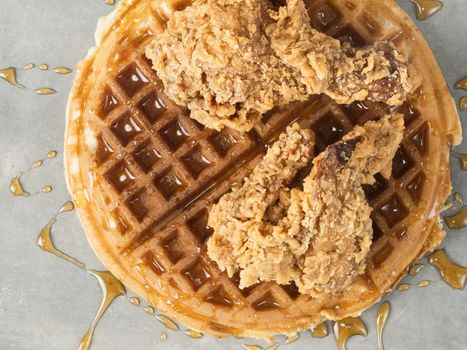 close up of rustic southern american comfort food chicken waffle