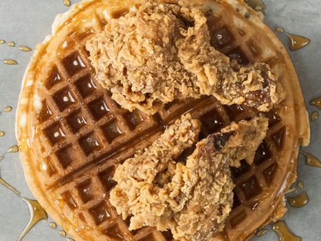 close up of rustic southern american comfort food chicken waffle