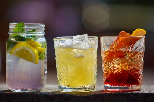 Negroni, Singapore Sling and fruit tea in the sunlight