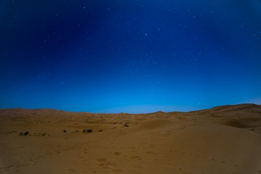 Stars at night over the dunes, Sahara Desert, Hassilabied, Morocco