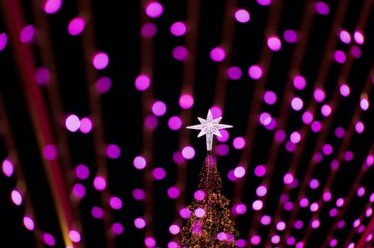 Christmas and New Year decoration with  blur beautiful pink bokeh background.