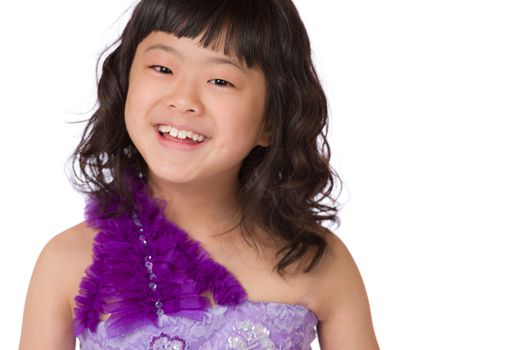 A portrait of a cute, happy and young Japanese girl in a purple dress on a white background.