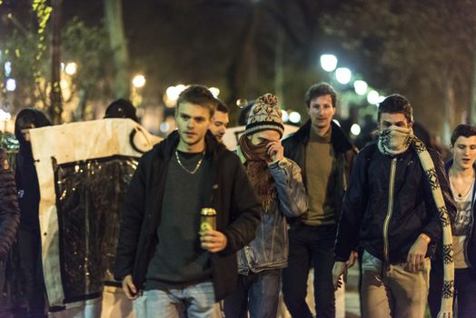 FRANCE, Paris: Nuit Debout militants hold a spontaneous demonstration, in Paris, as they want to reach French Prime minister Manuel Valls residence on April 9, 2016. 