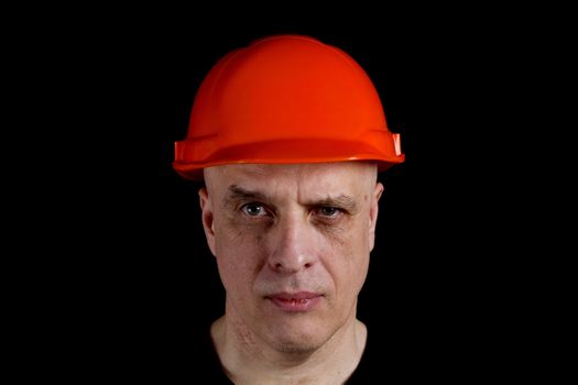 Construction building engineer or manual worker man in safety hardhat