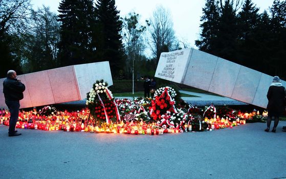 POLAND, Warsaw: Flowers are seen at the Slomensk monument at the commemoration ceremony of the Slomensk air crash at the Jozefa Oblubieńca church in Warsaw, Poland on April 10, 2016 during the sixth anniversary of the death of Polish President Lech Kaczynski and his wife Maria Kaczynska, who died along with 94 other political and military Polish elite when their plane crashed on April 10, 2010. 