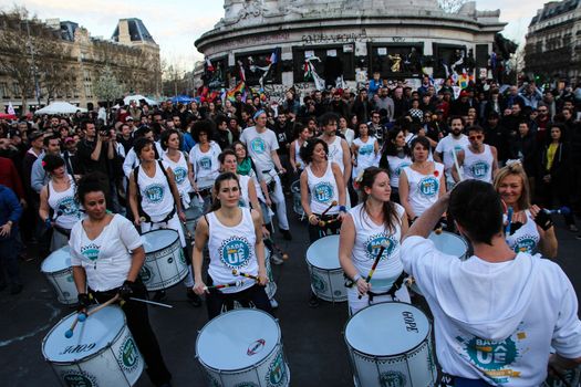 FRANCE, Paris: Thousand militants of the Nuit debout (Night Rising) movement gather on April 10, 2016 at the Place de la Republique in Paris, as participants plan to spend the night camped out to protest against the government's planned labour reform and against forced evictions. It has been one week that hundred of people have occupied the square to show, at first, their opposition to the labour reforms in the wake of the nationwide demonstration which took place on March 31, 2016.