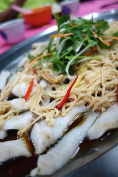 Steamed fish with soy sauce traditional chinese cuisine