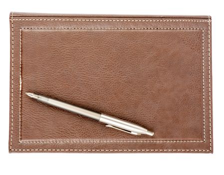 Leather daily planner with pen on isolated white background