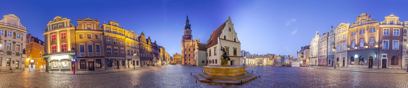 Night Skyline of Poznan Old Market Square in western Poland. Panoramic montage from 17 HDR images