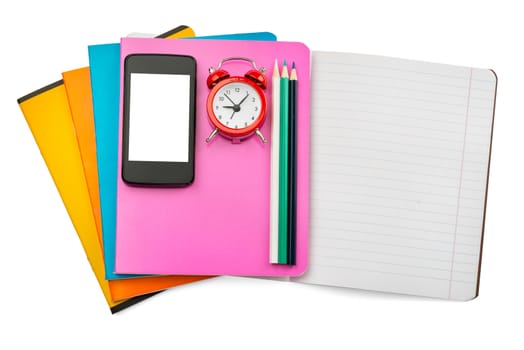Open notebook with smartphone and alarm clock on isolated white background, closeup