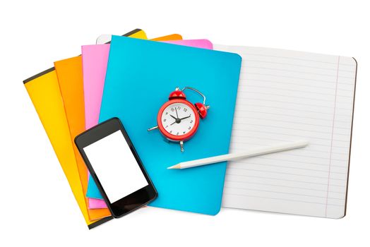 Open colorful notebook with smartphone and alarm clock on isolated white background, closeup
