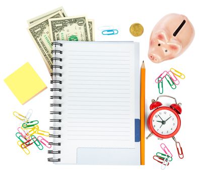 Open notebook with stationery and cash isolated white background, closeup