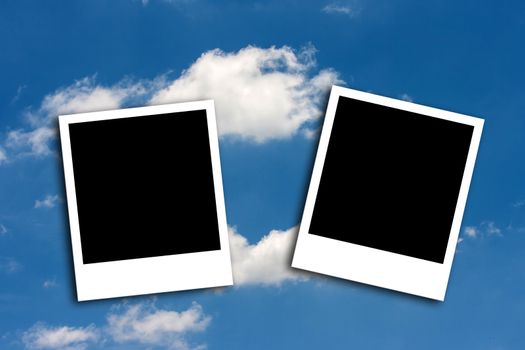 Photo frame on blue sky background