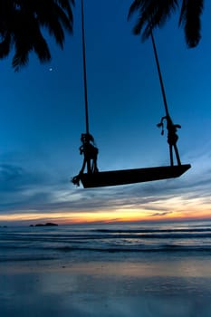 Empty Swing at Sunset Beach