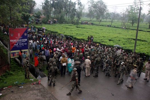 INDIA, Tinsukia: The streets are clogged after a protest where at least eleven people were killed, and twelve others injured, when a high-voltage electric cable was hit by stray police fire and fell on protesters in Tinsukia, Assam, India on April 11, 2016. Protesters had reportedly stormed a police station, calling on police to hand over a group of suspects arrested for killing two people last week. Police opened fire to disperse protesters, and a stray bullet severed the power line, which fell and electrocuted demonstrators.