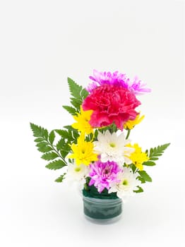 Colorful flower bouquet arrangement in vase on white background