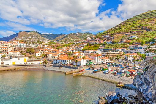 Camara de Lobos, Madeira - June 8, 2013: Port with fishing boats. The village is typical for its cat shark drying under the sun.