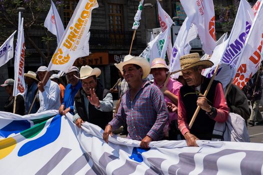 MEXICO, Mexico City: Hundreds march through Mexico City on April 11, 2016 — the day following revolutionary Emiliano Zapata's death anniversary — to draw attention to desires of several indigenous communities. Campesinos, people who live in the rural areas- from all Mexican states, came to the capital to express their discontent with the government. The demonstration was also held to commemorate the famous revolutionary Emilio Zapata.